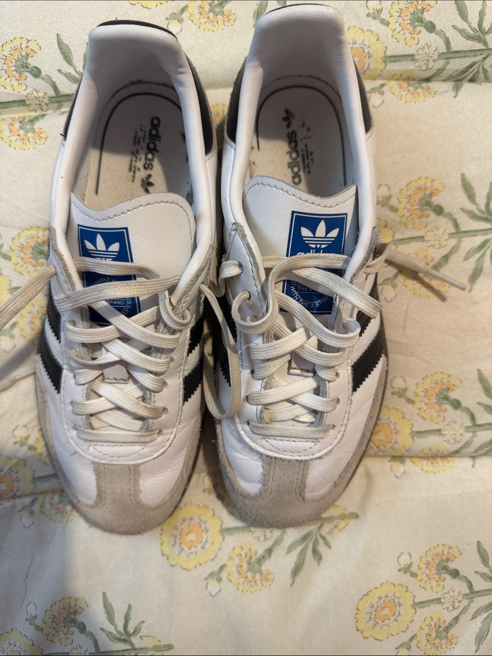 adidas White Sneakers with Black Stripes and Blue Tongue Logo